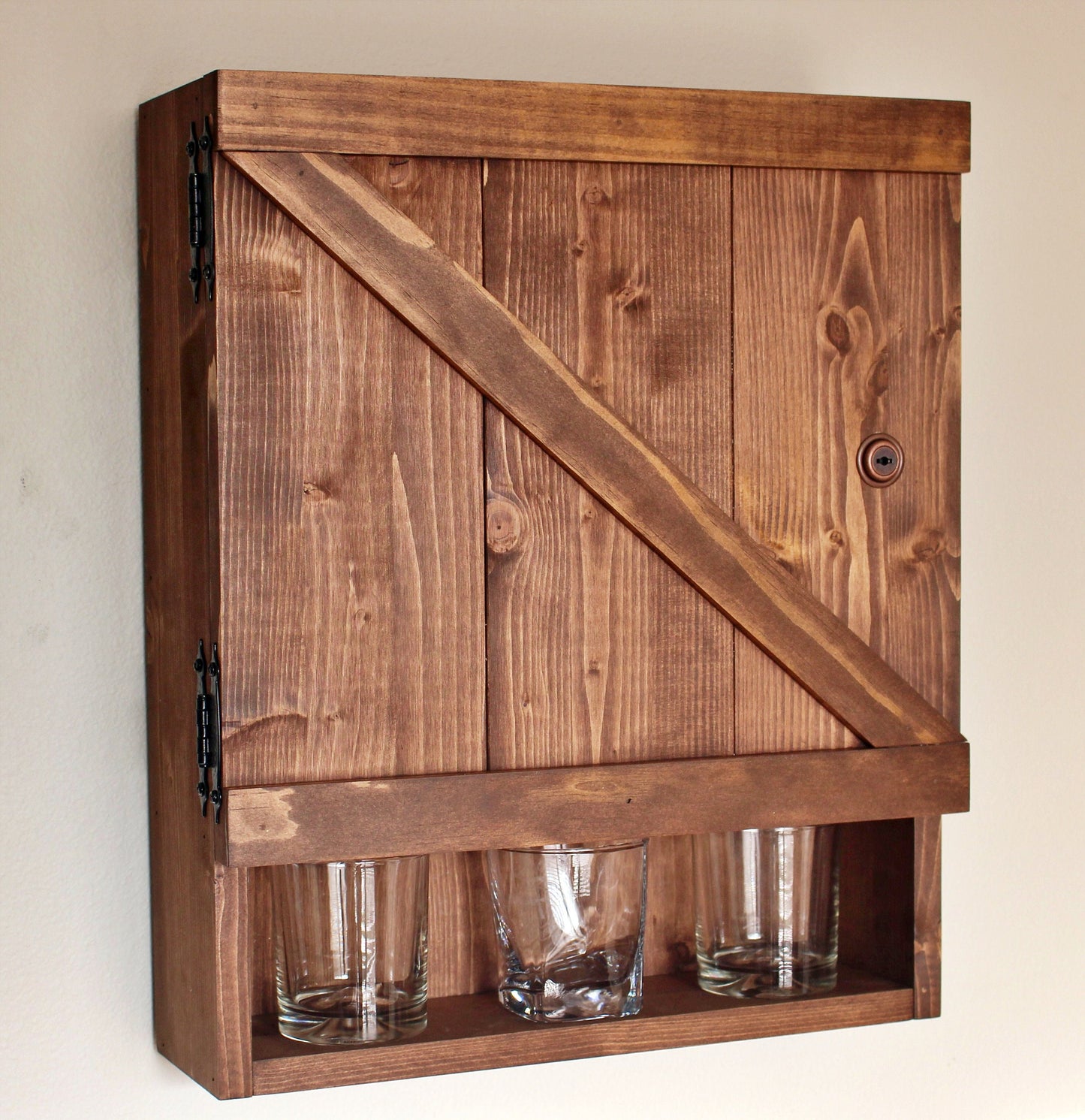 Barn door whiskey cabinet